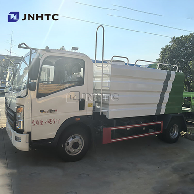 HOWO মিনি 3000L ডাস্ট ক্যানন সহ ওয়াটার ট্রাক