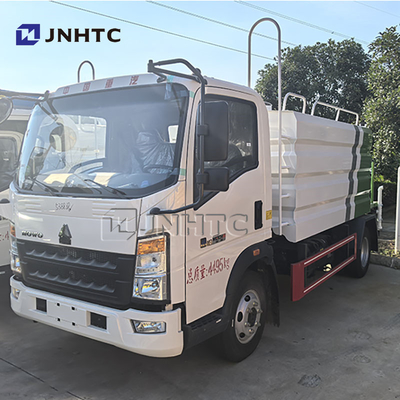 HOWO মিনি 3000L ডাস্ট ক্যানন সহ ওয়াটার ট্রাক