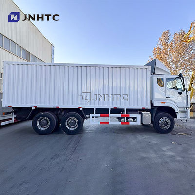 SINOTRUK HOWO NX340 10 চাকা 6X4 30 টন ডেলিভারি পরিবহন ভ্যান কার্গো ট্রাক বিক্রয়ের জন্য ইউরো 2 RHD