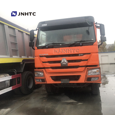 HOWO 8x4 371hp 27M3 12 চাকার সেলফ লোডিং ডাম্প ট্রাক তানজানিয়ার জন্য