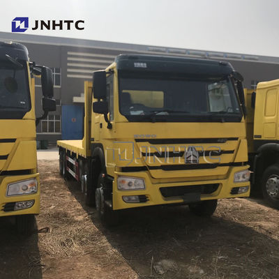 সিনোট্রুক 8*4 22-30 টন অবতল ফ্ল্যাটবেড পরিবহন ট্রাক খননকারী পরিবহন ট্রাক